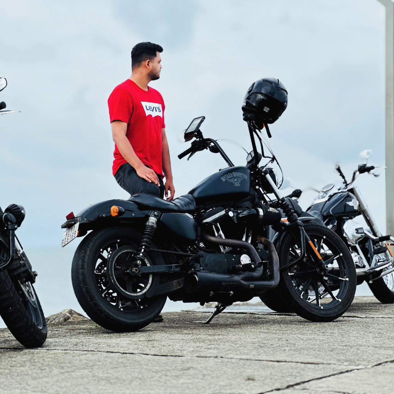 Sourav with his Iron 883 by the sea
